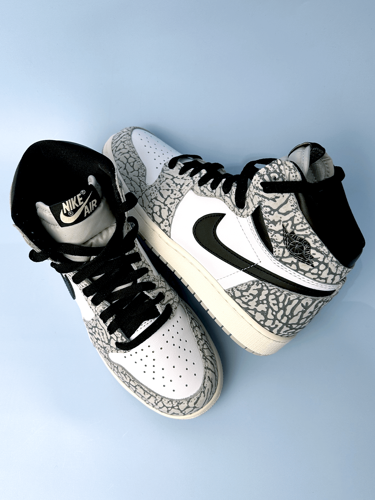 White elephant top jordan 1
