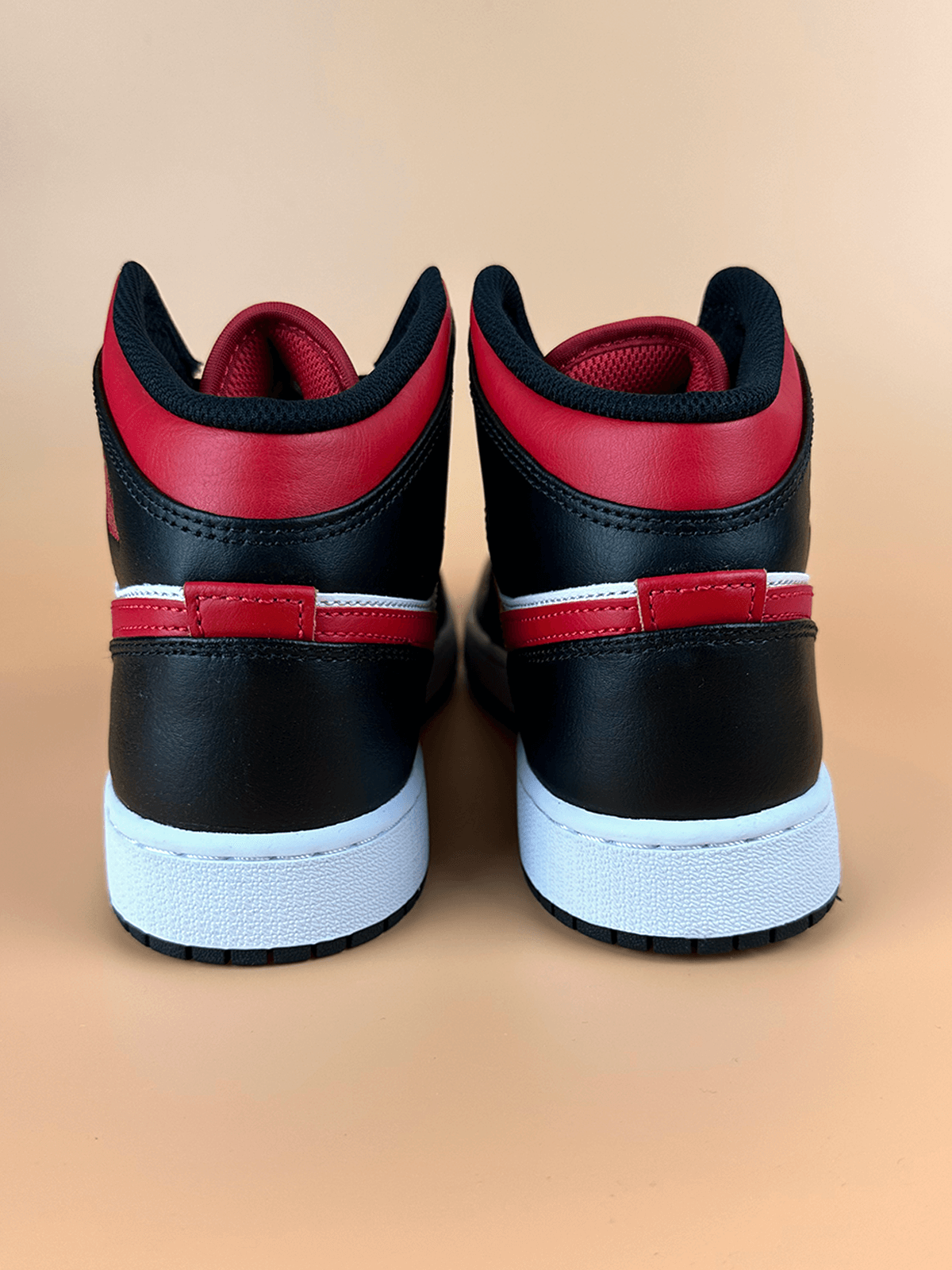 Jordan 1 Mid Black Fire Red