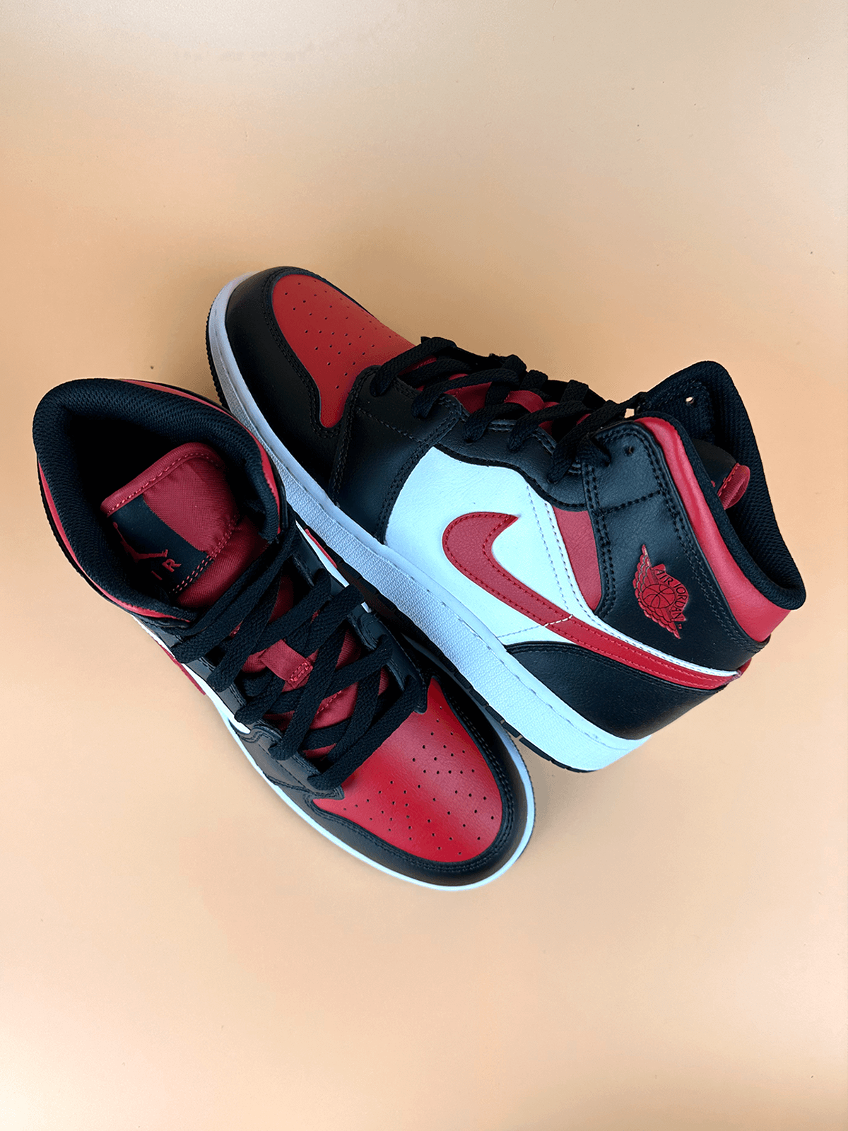 Jordan 1 Mid Black Fire Red