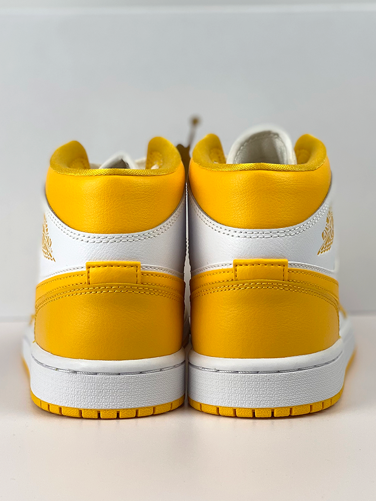 Jordan 1 Mid White University Gold