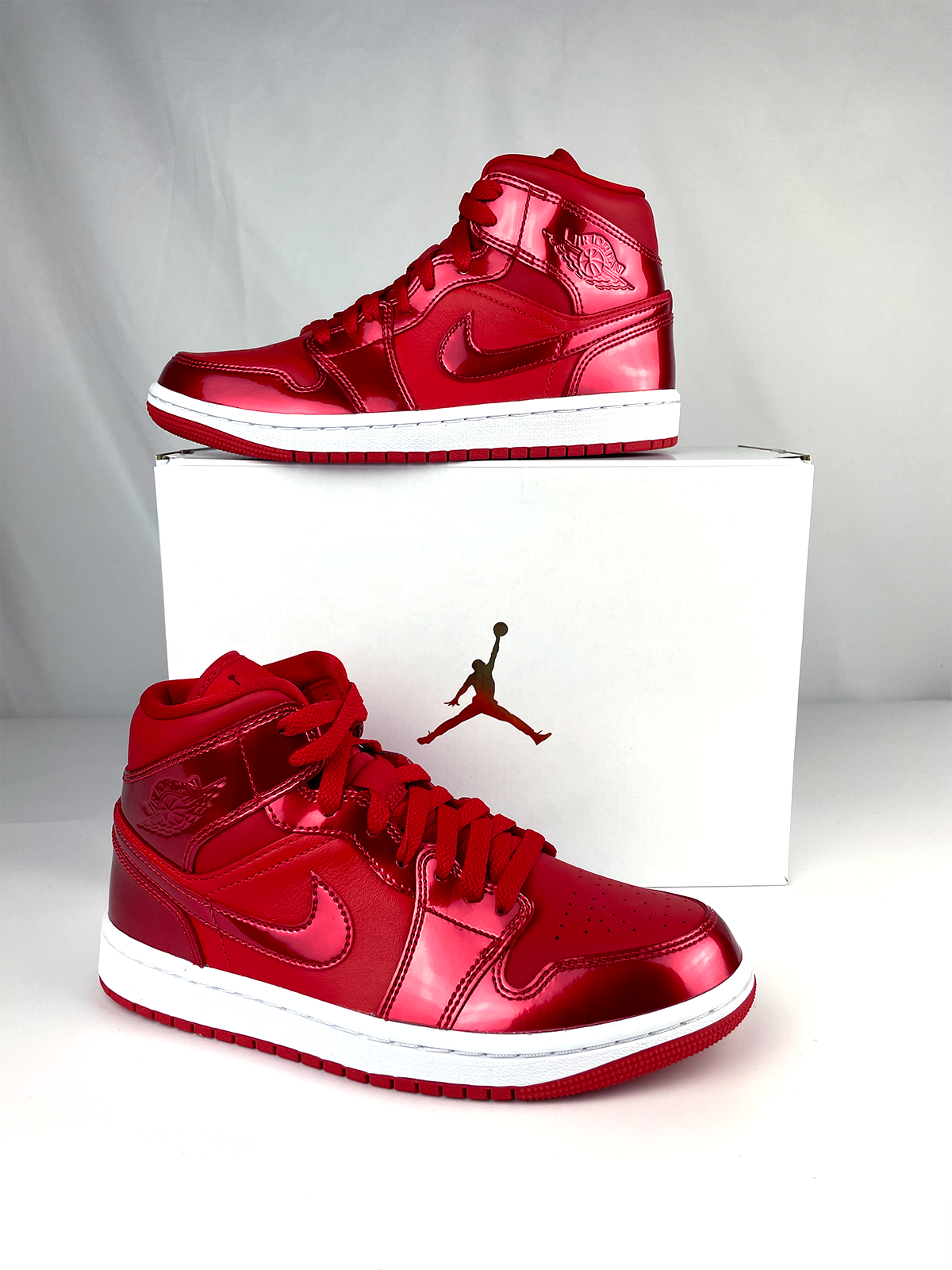 Jordan 1 Mid SE Pomegranate