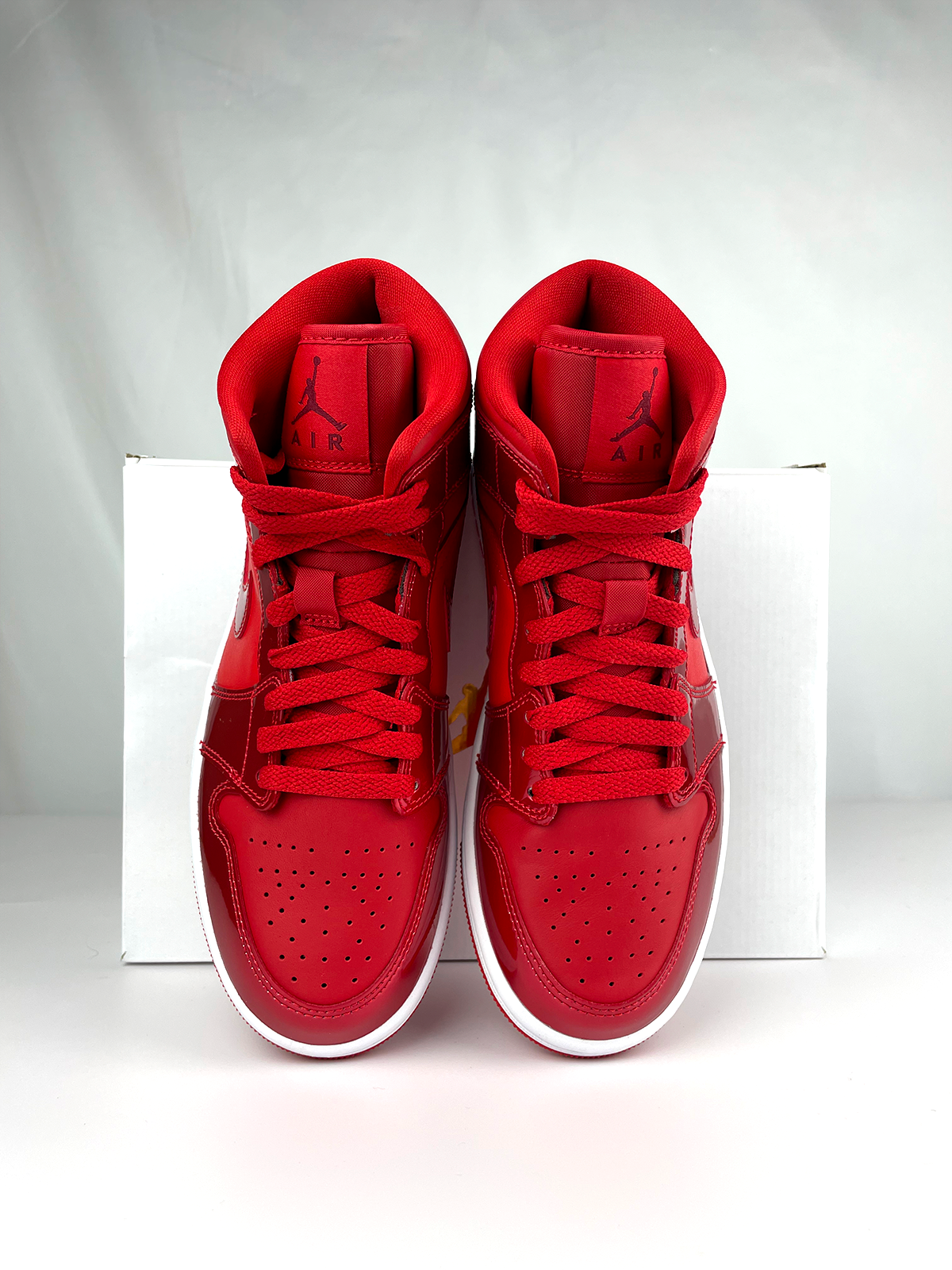 Jordan 1 Mid SE Pomegranate
